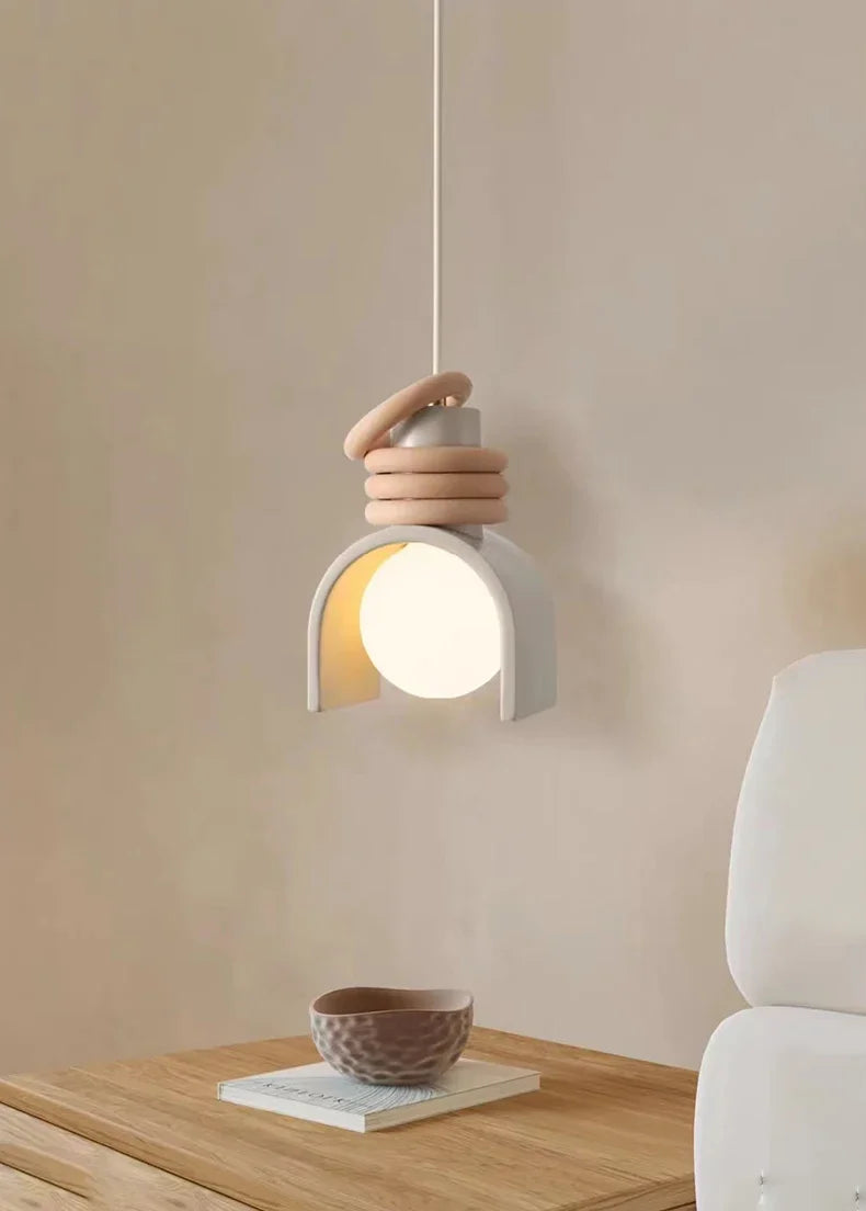Arc of Calm Pendant Light in pale grey ceramic with frosted glass globe creating tranquil ambient lighting for minimalist Australian living spaces ,by Domus Collective.