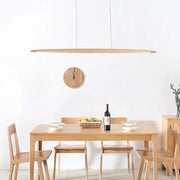 Float Board Pendant Lamp in natural oak finish with surfboard-inspired silhouette, handcrafted wooden linear pendant bringing organic warmth to Scandinavian dining spaces, by Domus Collective.