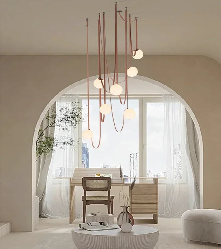 Floating Moons Pendant Light cluster with opal glass spheres and warm leather suspension cords, curated pendant lighting bringing celestial elegance to contemporary home offices, by Domus Collective.