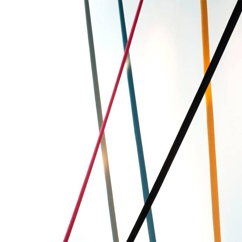 Abstract composition of Illuminus Threads Suspension Light in white, red, teal, black, and orange creating intersecting diagonal lines, highlighting the vibrant colour palette and minimalist linear design aesthetic.