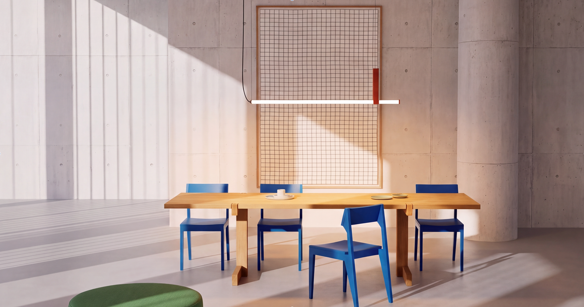 In Parallel Suspension Light in red vegan leather, a single line of warm light drawn above a long timber dining table and cobalt chairs, sunlight and soft shadow falling across a calm, contemporary loft, by Domus Collective.