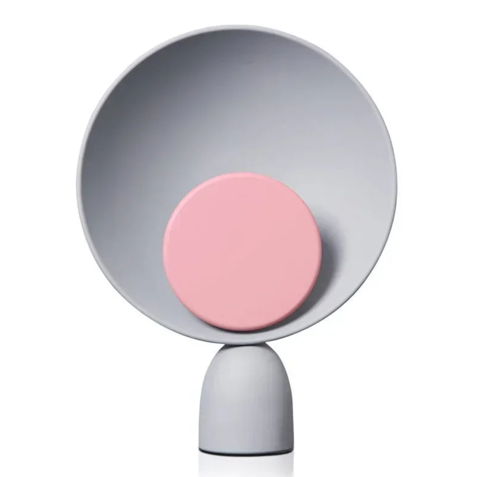 Front view of Lunar Eclipse Table Lamp showcasing the pink accent disc positioned within the concave grey reflector, highlighting the lamp's cosmic-inspired design and balanced proportions, by Domus Collective.