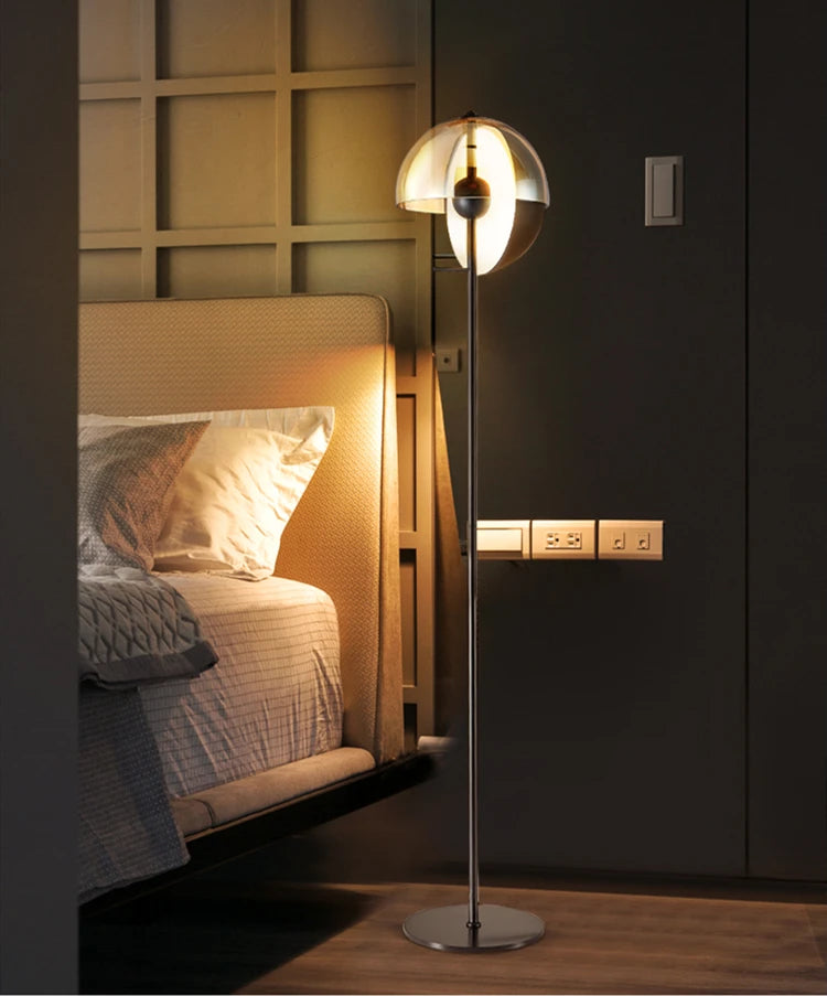 Lunar Visor Floor Lamp with chrome stem and smoked glass globe creating intimate bedside ambiance in a sophisticated modern bedroom, celestial-inspired lighting by Domus Collective.