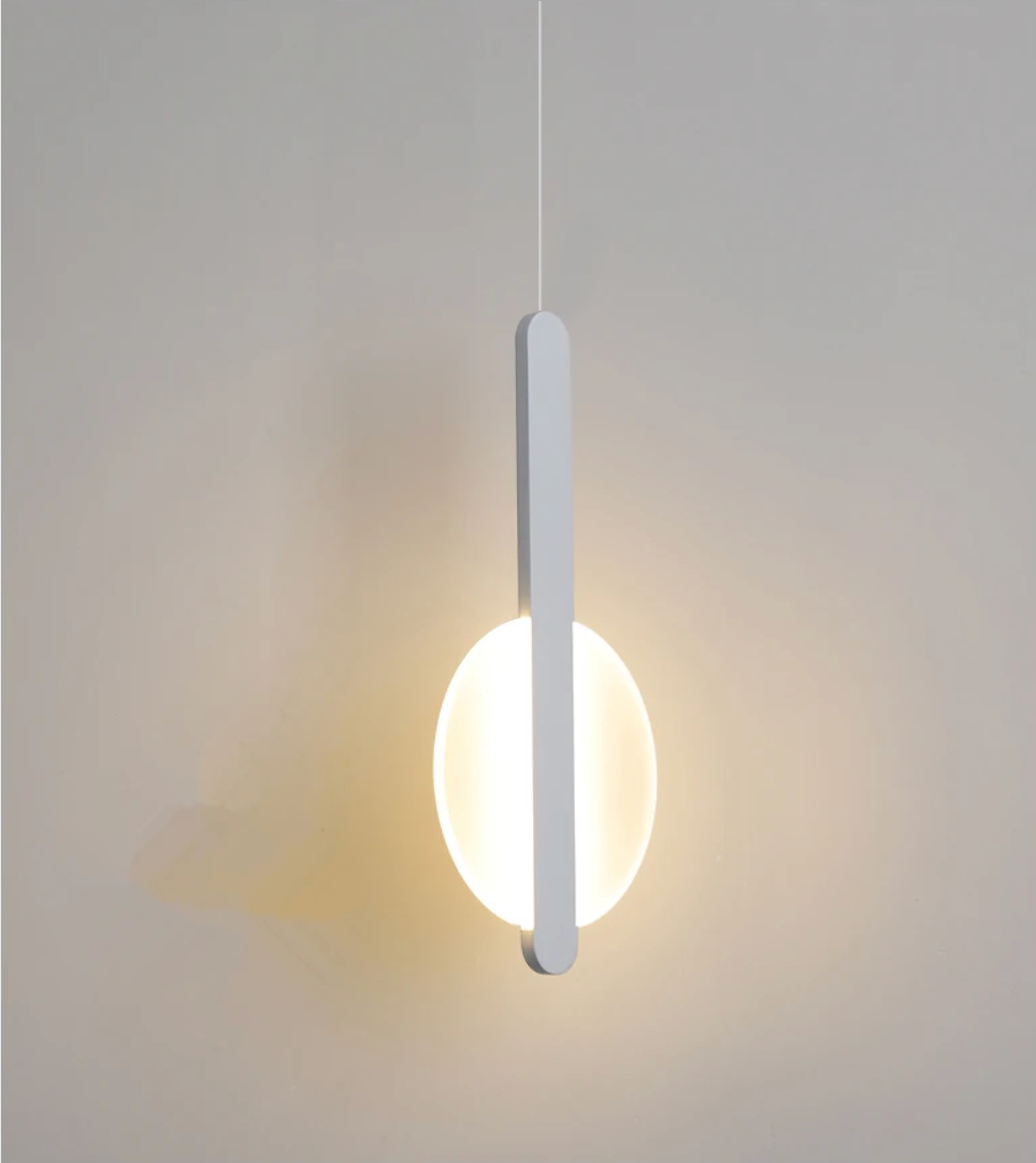 Slim white metal bar cradling a luminous frosted sphere, the Matchstick Slice Pendant Light offers serene, gallery-worthy presence and soft diffused lighting, by Domus Collective.