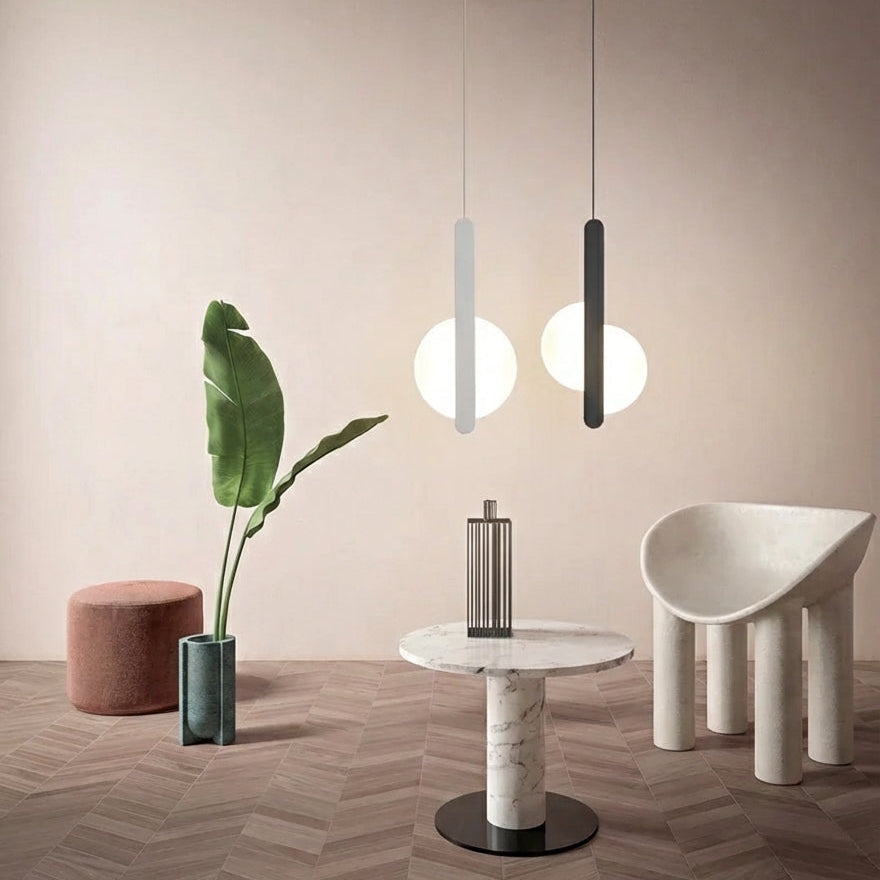  Curated designer pendant lighting in soft white and charcoal finishes, the Matchstick Slice casts inviting warmth over sculptural furniture and refined interiors, by Domus Collective