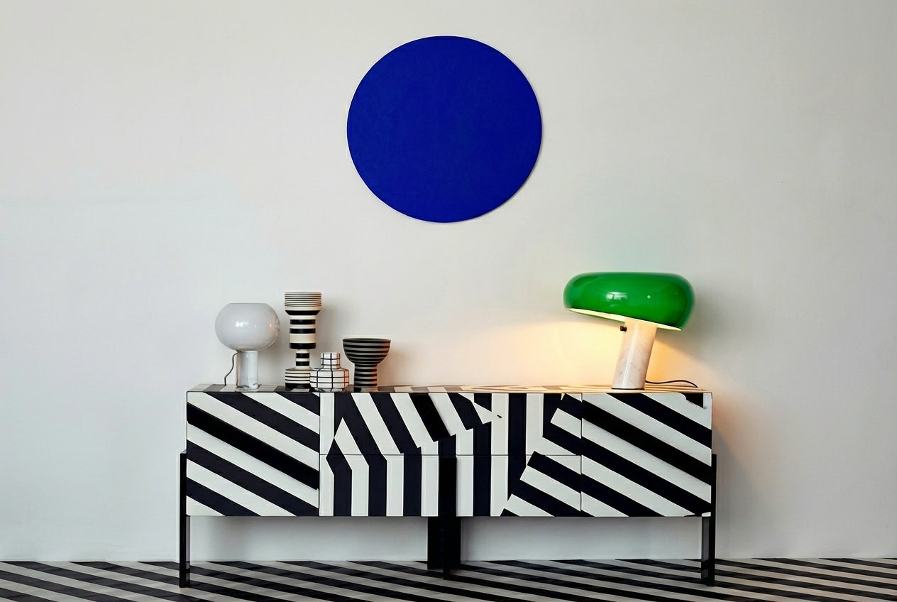 Glossy green Mushroom Beam Table Lamp as bedside lighting in a moody contemporary bedroom with navy and terracotta tones, vibrant accent piece by Domus Collective.