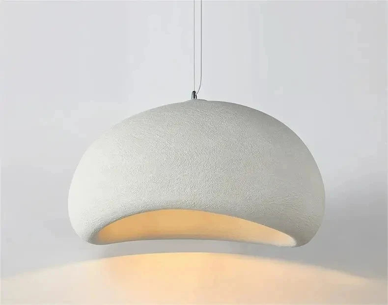 Organic Stones Pendant Light by Domus Collective in white, clean product shot showing the smooth domed exterior and warm interior glow, river-stone elegance for contemporary living spaces.