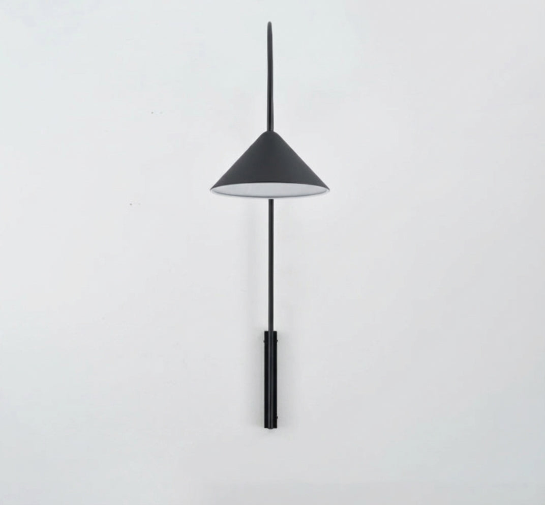 Out Fishing Wall Lighting featuring sleek black metallic finish with elongated stem and conical shade,a Domus Collective statement piece combining sculptural form with functional directional lighting.
