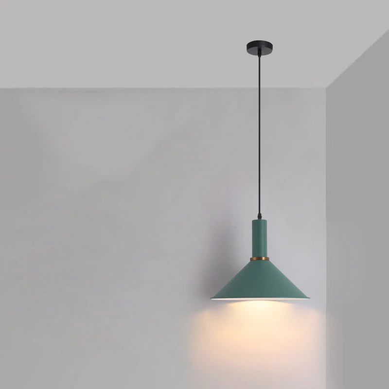 Earthy sage green cone with brass accent ring brings natural calming tones to Scandinavian kitchens in this Pastel Rainbow Pendant Light, by Domus Collective.