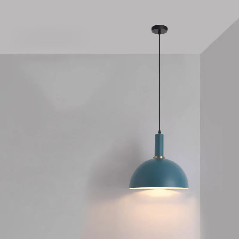 Muted teal dome with brass collar accent creates calming Nordic ambiance in this handcrafted Pastel Rainbow Pendant Light for serene bedrooms, by Domus Collective.