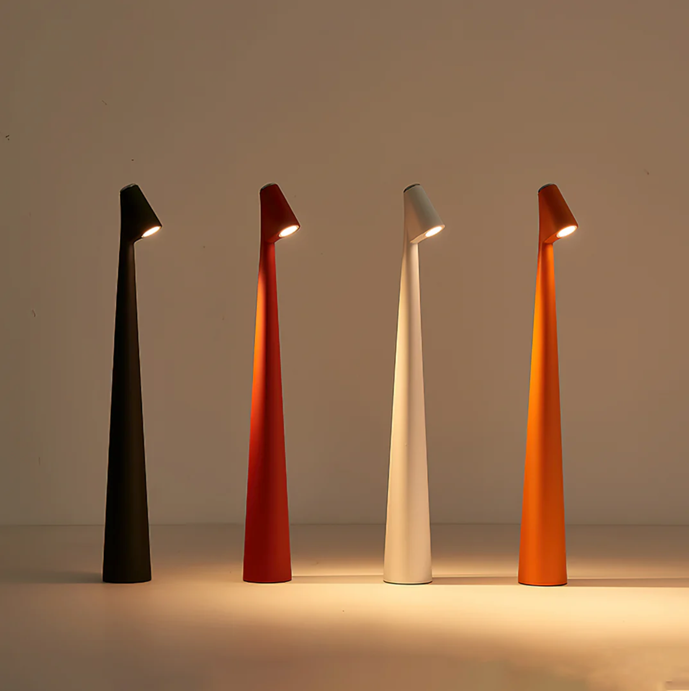 Four Sculptural Street Pole Light  Portable lamps in black, red, white, and orange on a neutral background matching the colors of the Australian household and enviroment. Made for  creating comfort and peacefulness
