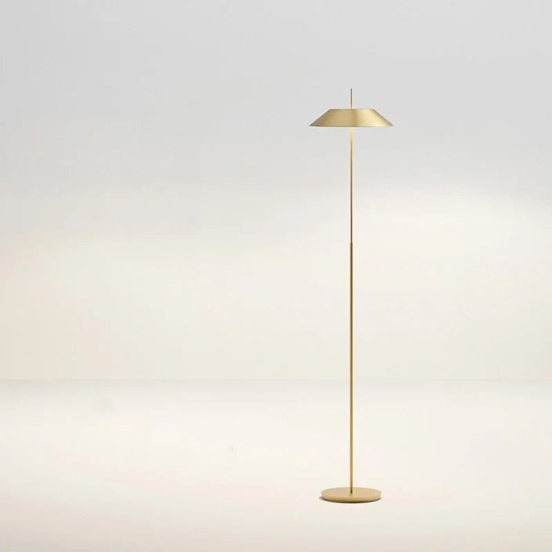 Full-length view of the Toothpick Balance Floor Lamp in satin brass, precision-crafted metal construction with perfectly balanced proportions for modern minimalist spaces, by Domus Collective.