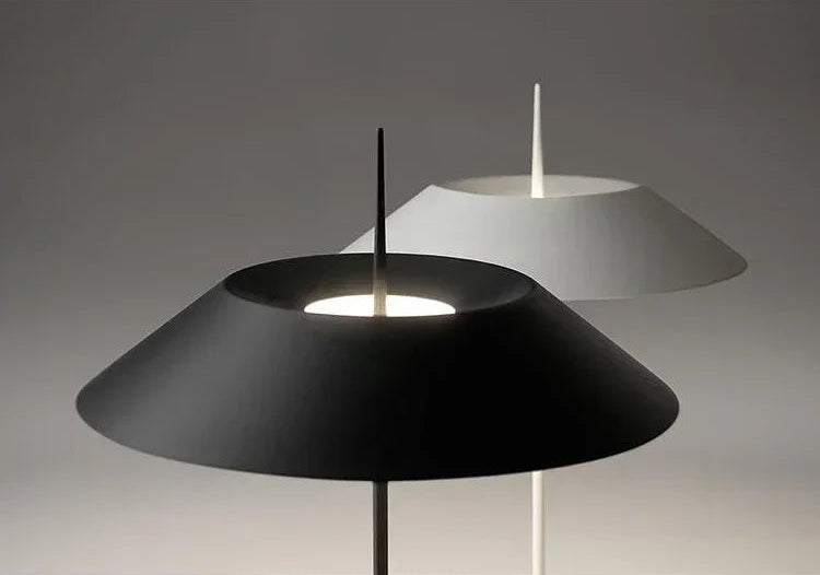 Conical shade detail showing matte black and off-white Toothpick Balance Floor Lamp finishes, sculptural metal design with signature tapered finial, by Domus Collective.