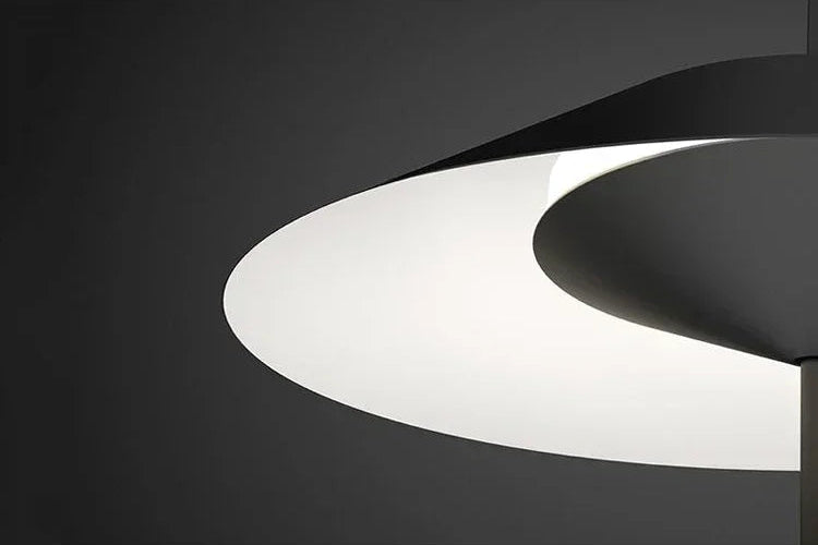 Close-up of the Toothpick Balance Floor Lamp shade in graphite black, illuminated diffuser revealing precision engineering and soft downward glow, by Domus Collective.