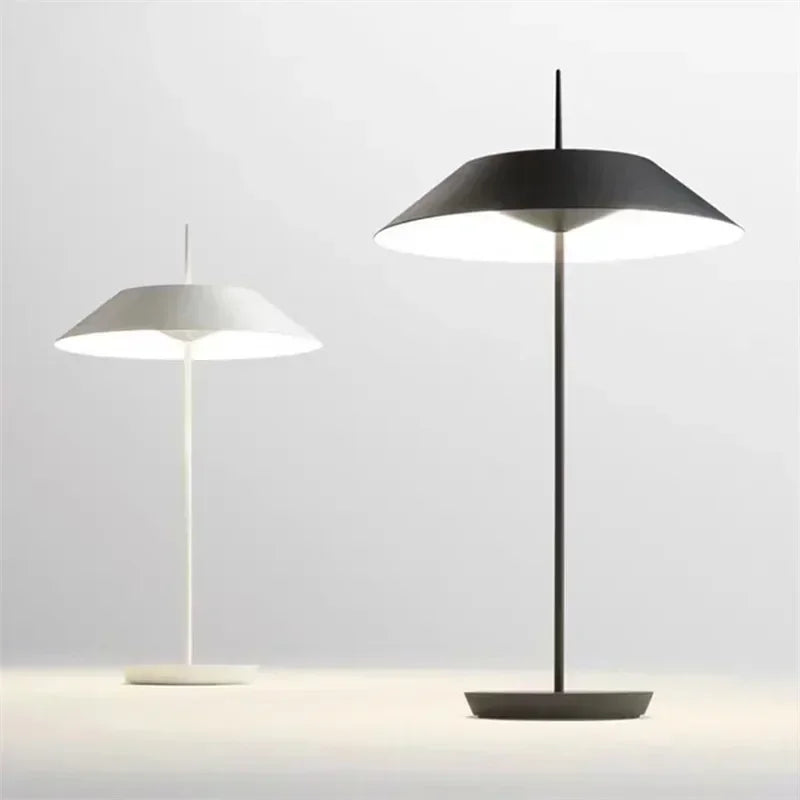Toothpick Balance Table Lamp duo in white and black finishes showcasing the iconic parasol shade design with soft diffused LED illumination, coordinated modern lighting by Domus Collective.