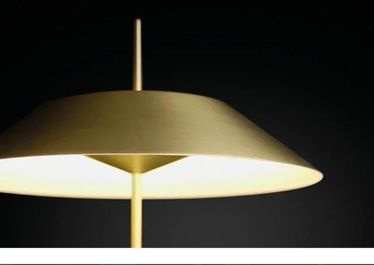 Underside view of the brushed gold Toothpick Balance Table Lamp highlighting its flared shade interior and central stem junction, elegant lighting design by Domus Collective.