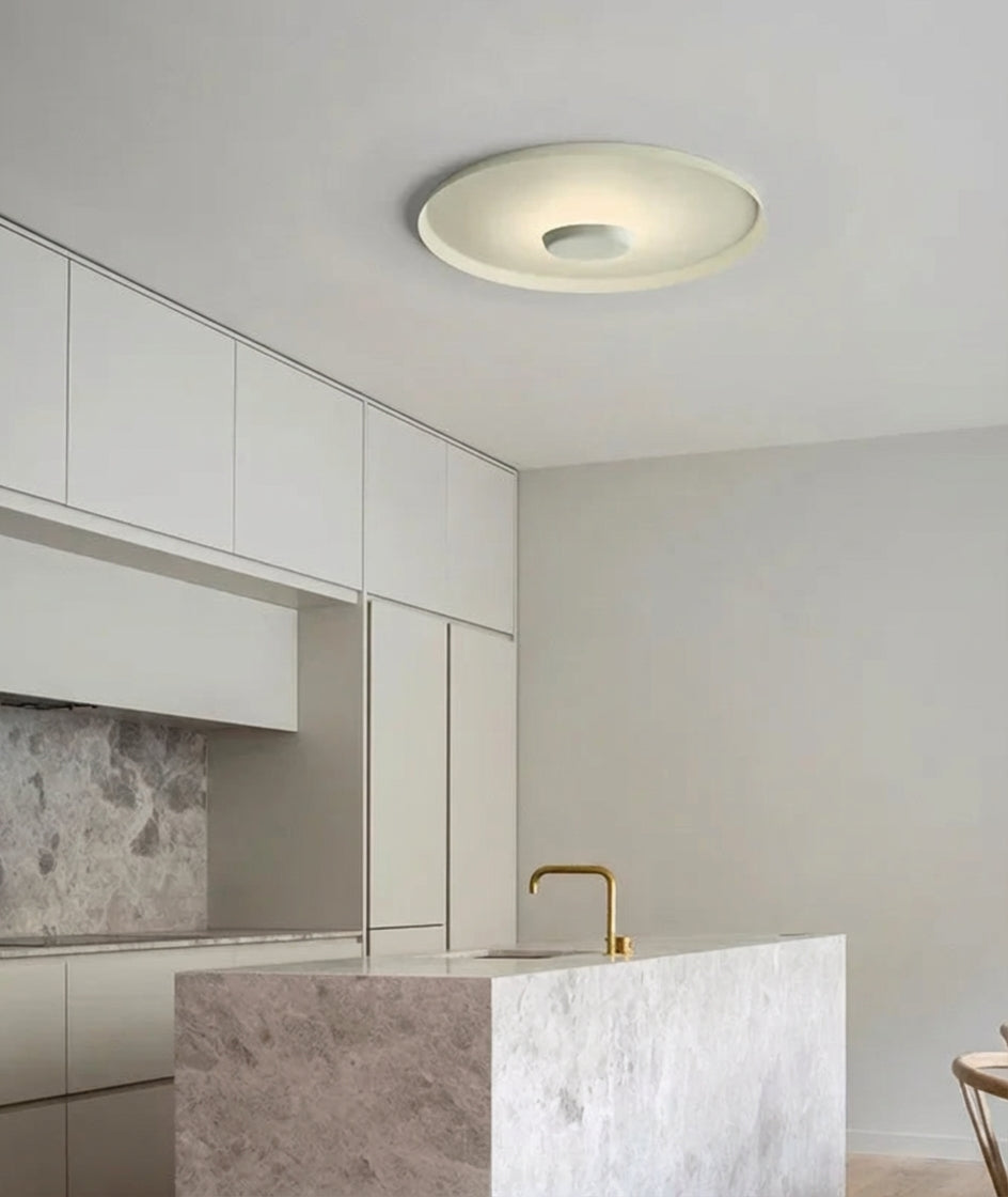 Minimalist UFO Wall Lighting flush-mounted to ceiling in a refined marble kitchen, delivering sophisticated ambient lighting with its organic concave form, Domus Collective modern design for elevated Australian living.
