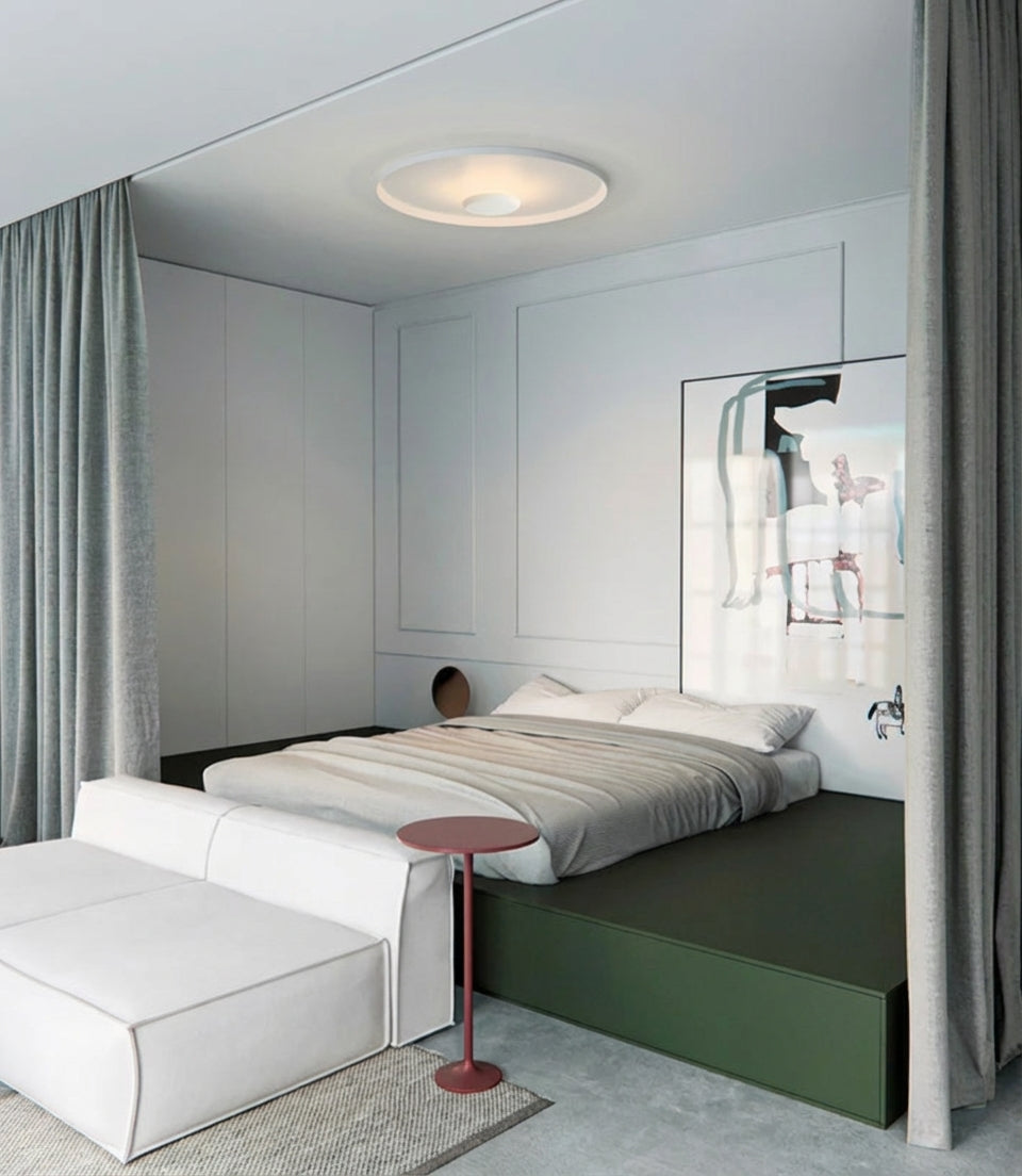 Contemporary UFO Wall Lighting in white creating sanctuary in a sophisticated bedroom setting with warm soft illumination, Domus Collective curated wall lamp for timeless, wellbeing-focused interiors.